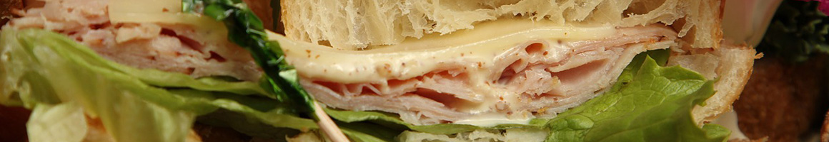 Eating Sandwich at PB Wraps - West Palm Beach restaurant in West Palm Beach, FL.
